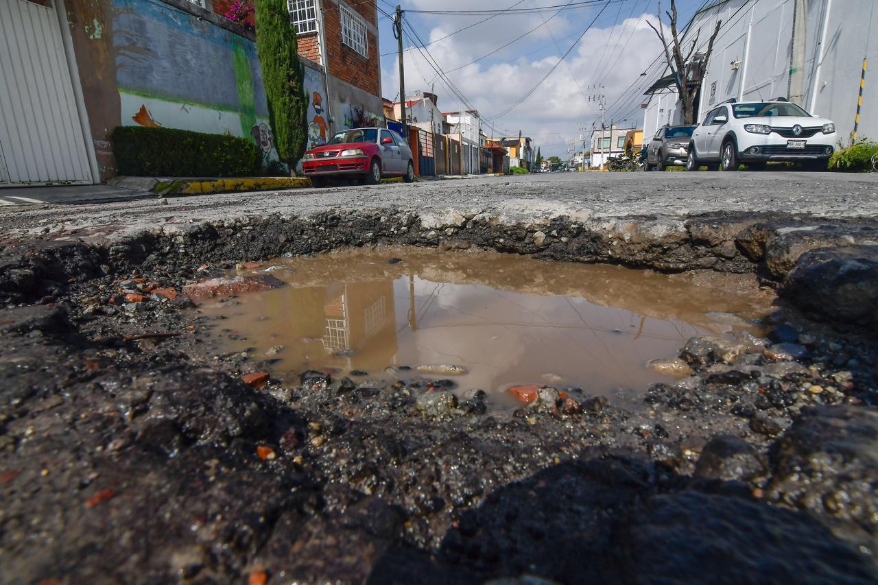 Problemática con el aumento de baches en Av. Almoloya de Juárez Edomex.