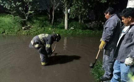 Desazolvan calles de San Pedro Totoltepec tras inundación por lluvias 
