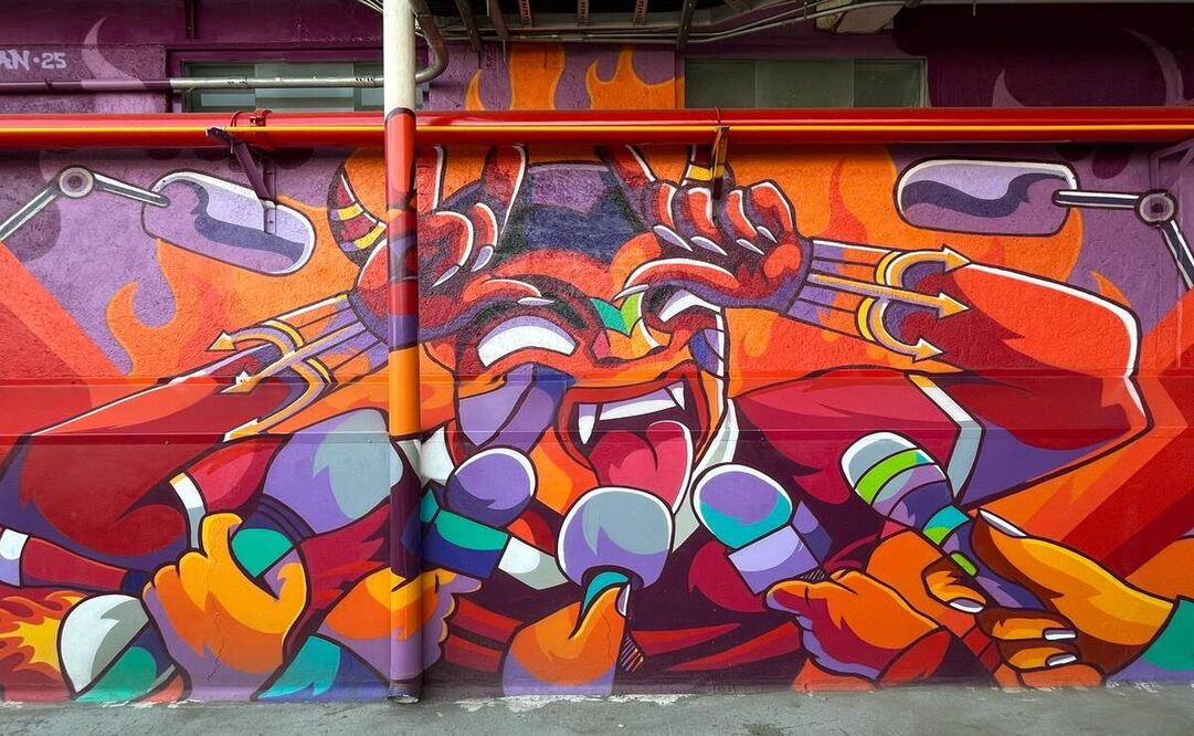 La figura central del mural es un Diablo, con la característica señal del festejo que hacen los jugadores cuando cae el gol. Foto: Karen Almada / El Universal Estado de México