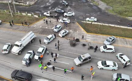 Bloqueo en la México-Querétaro se mantiene, exigen localización de taxistas desaparecidos