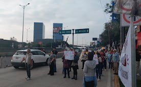 Vecinos bloquean laterales de Periférico Norte; exigen frenar bodegas en zona habitacional