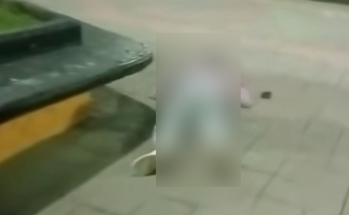 La mujer intentó correr, sin embargo, fue alcanzada por las balas y su cuerpo quedó tendido boca abajo. Foto: Especial