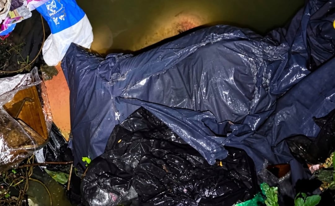 Zona de San Rafael Chamapa en Naucalpan, donde elementos de la Guardia Municipal y bomberos localizaron el cuerpo envuelto en bolsas oscuras. Foto Especial